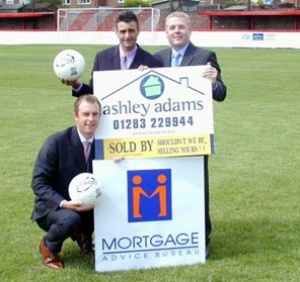 Mark Evans with staff from Ashley Adams