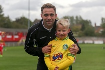 Carl Slater with the match day mascot