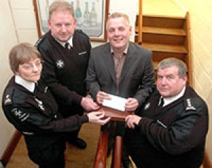 Mark Evans with members of the Church Gresley St John Ambulance Brigade